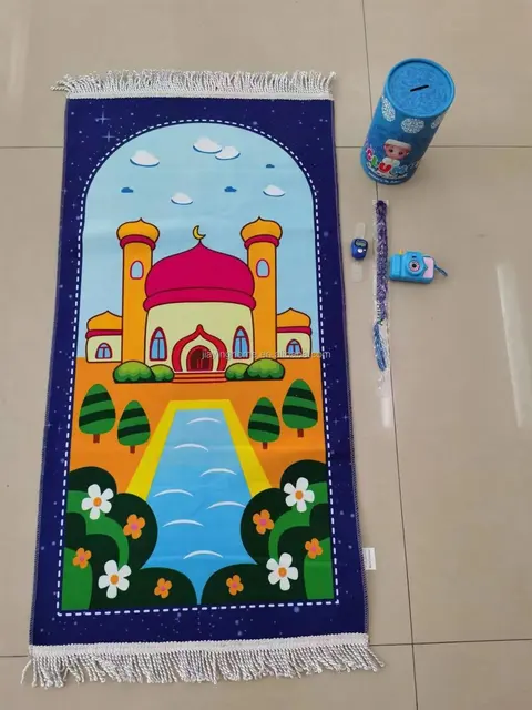 هدية سجادة و سبحة و كاميرا و حصالة نقود  gift of a mat, islamic rosary, a camera and a money box